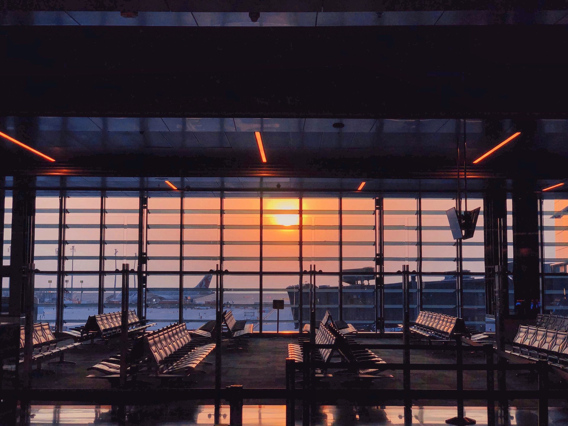 airport lounge with the airport in view through the windows