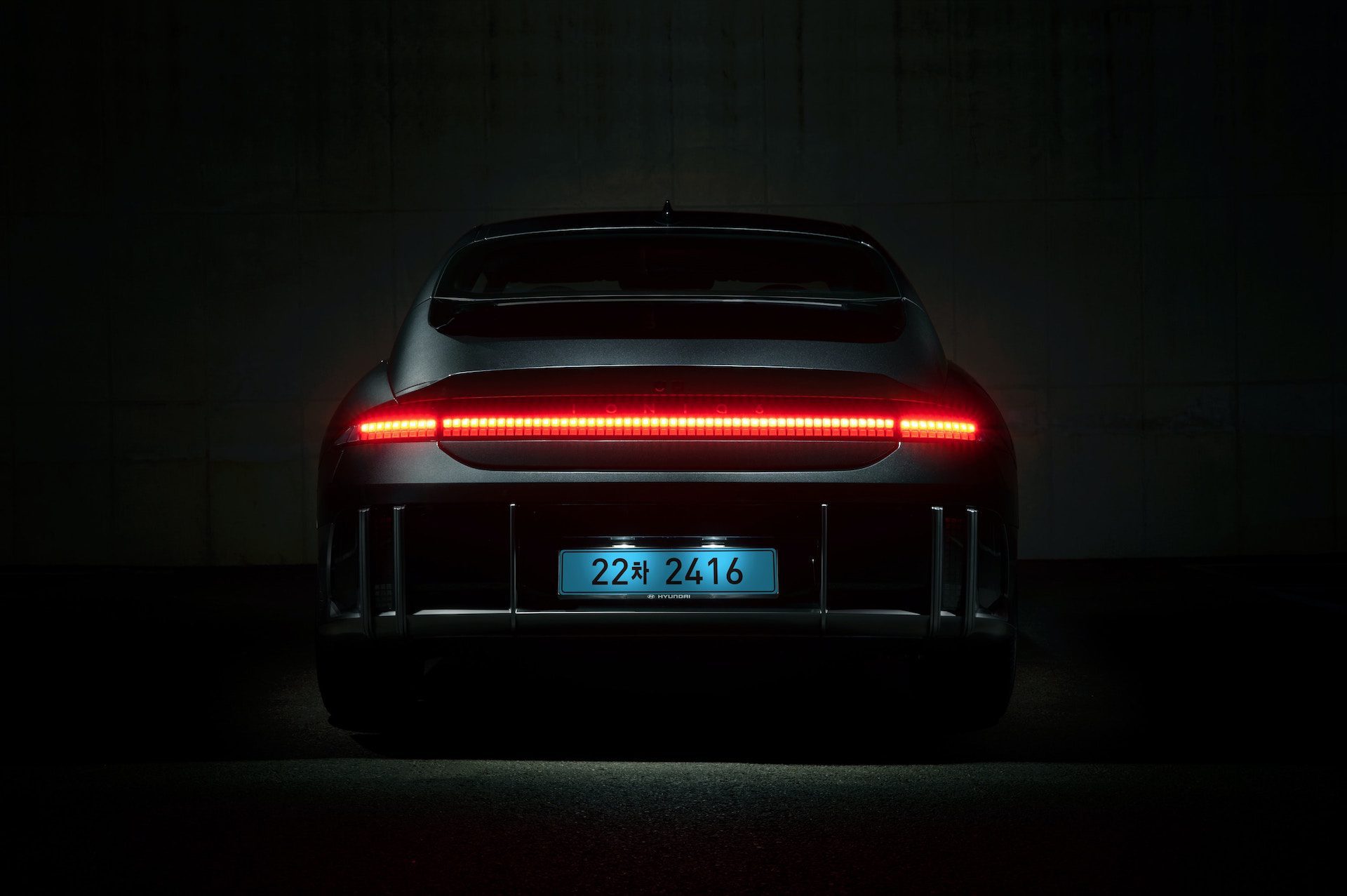 car with red neon backlight